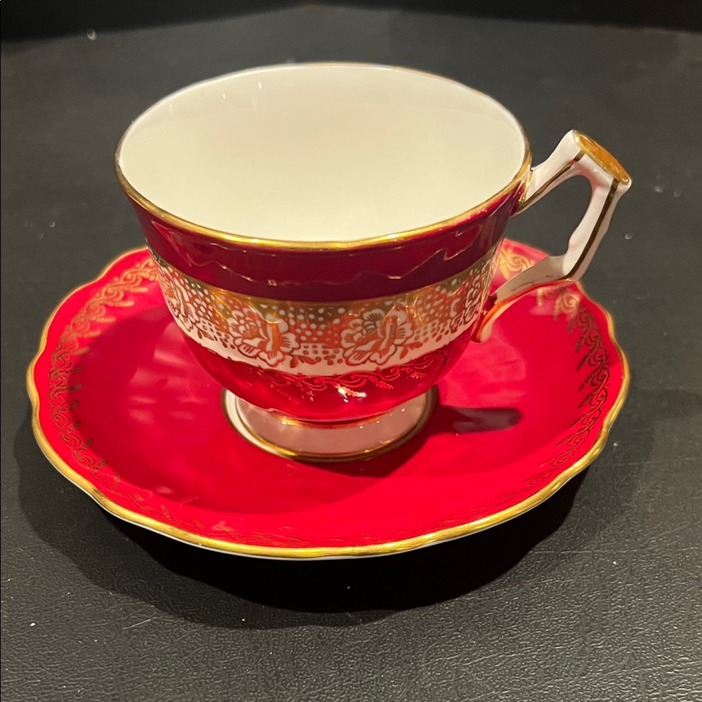 Luxurious Red and Gold Teacup and Saucer Set